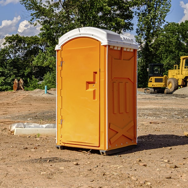 what is the cost difference between standard and deluxe portable restroom rentals in Hugo MN